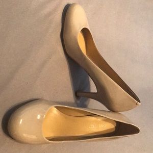 Nude patent heels